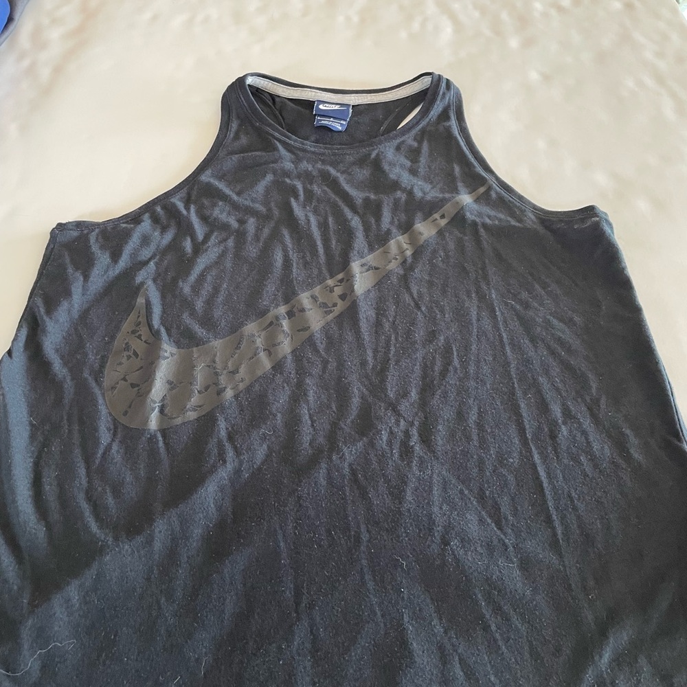 Nike tank top size small.  In excellent condition.